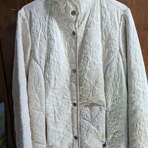 Cream colored, embroidered Woolrich ladies jacket